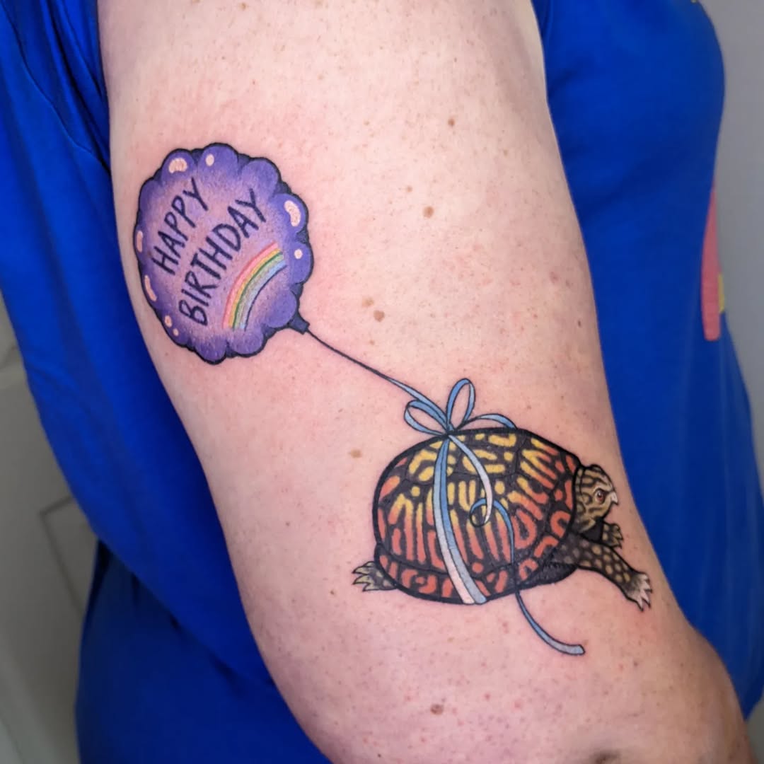 whimsical turtle tattoo celebrating a birthday