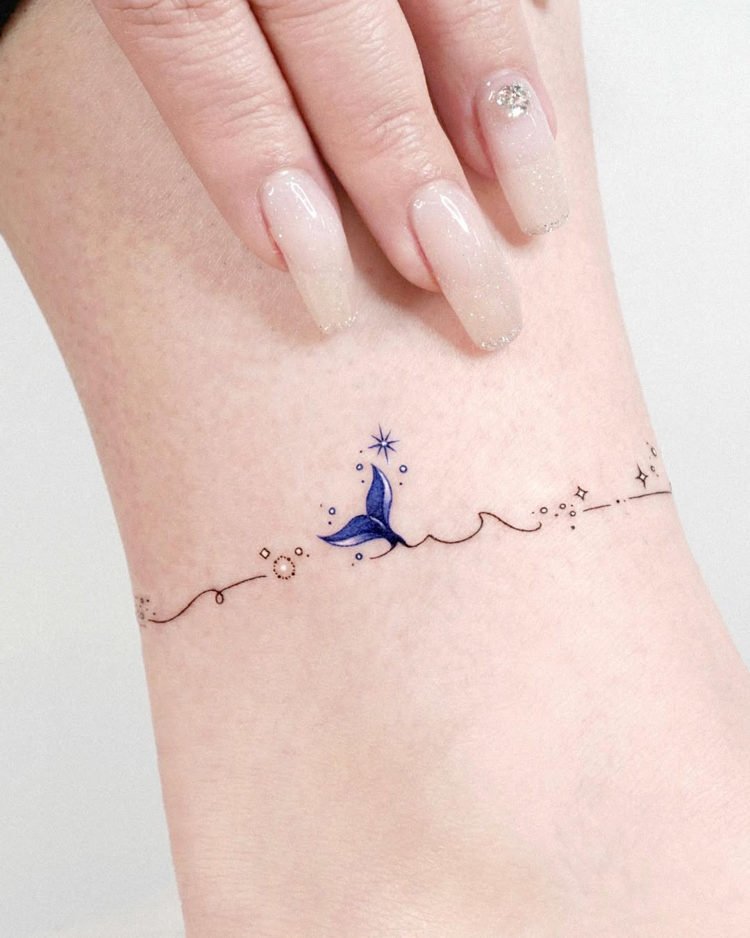 Charmingâ Wave Tattoo