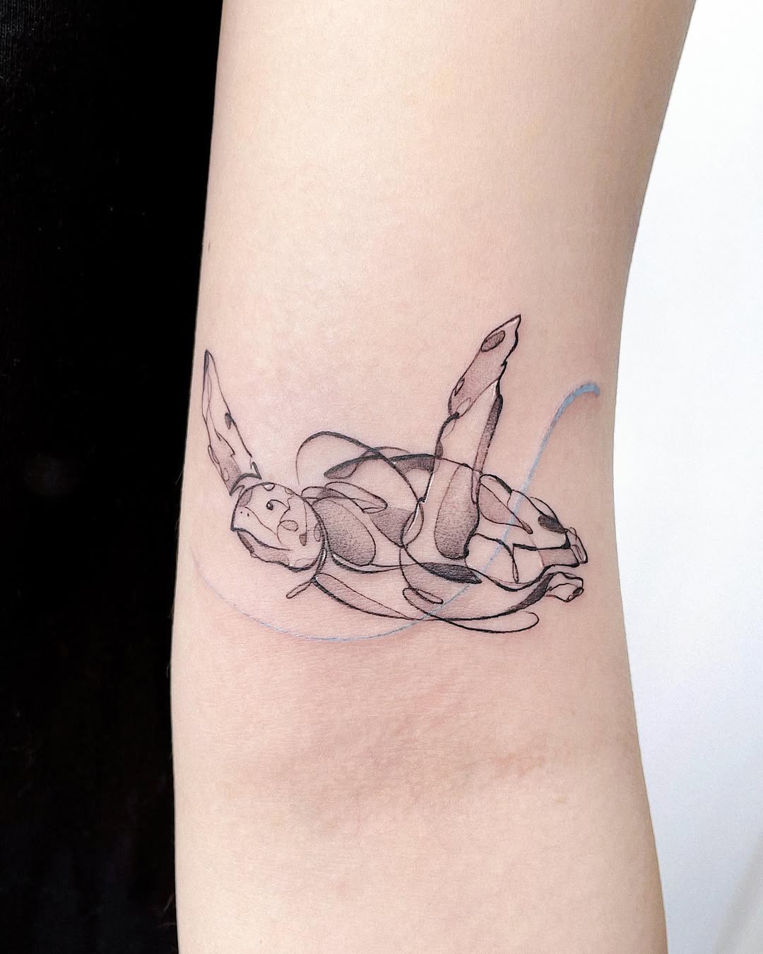 Elegant Minimalist Turtle Tattoo design