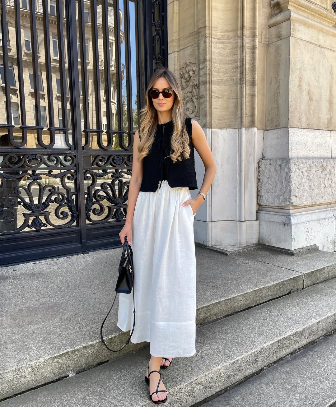 Chic black top paired⁢ with flowy ⁣white⁢ skirt