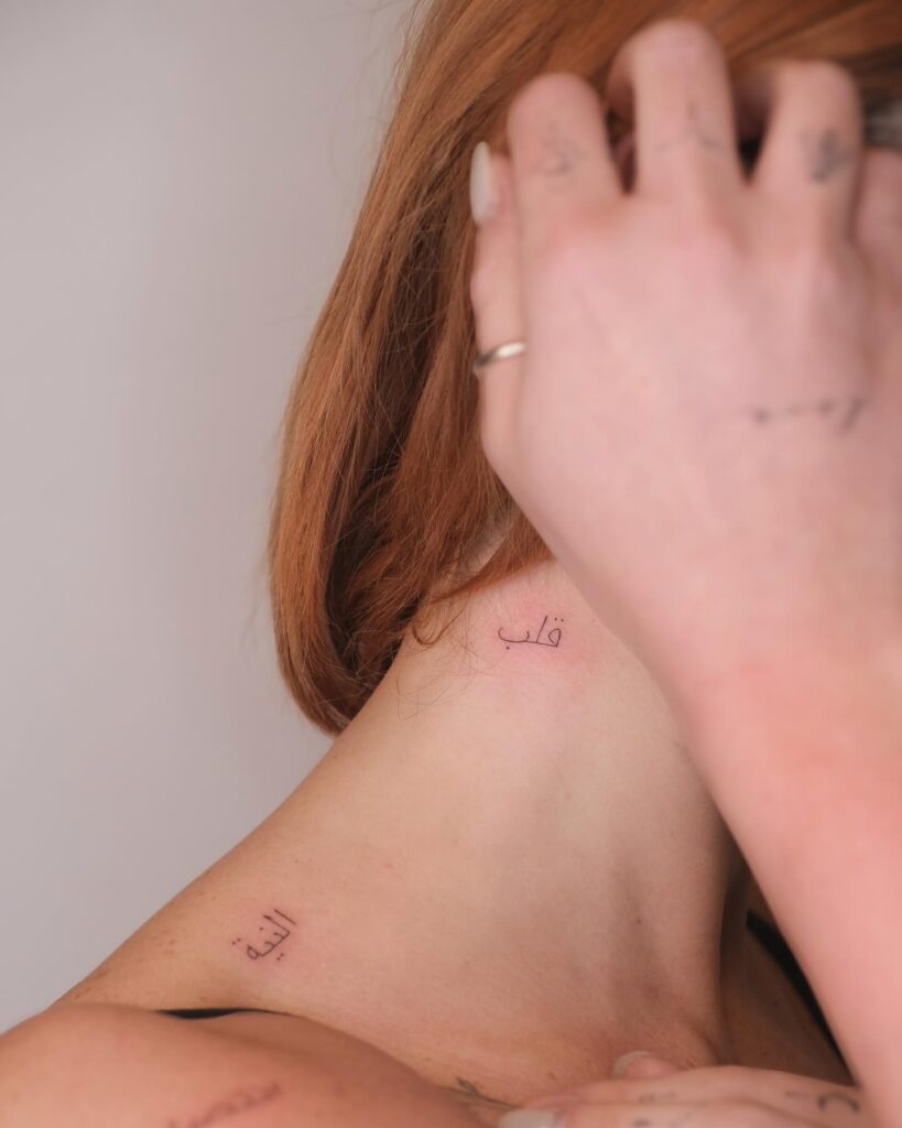 'قلب' Cuore' Tattoo in Arabic Script on the Side of the Neck, a Subtle Statement: Arabic Whispers