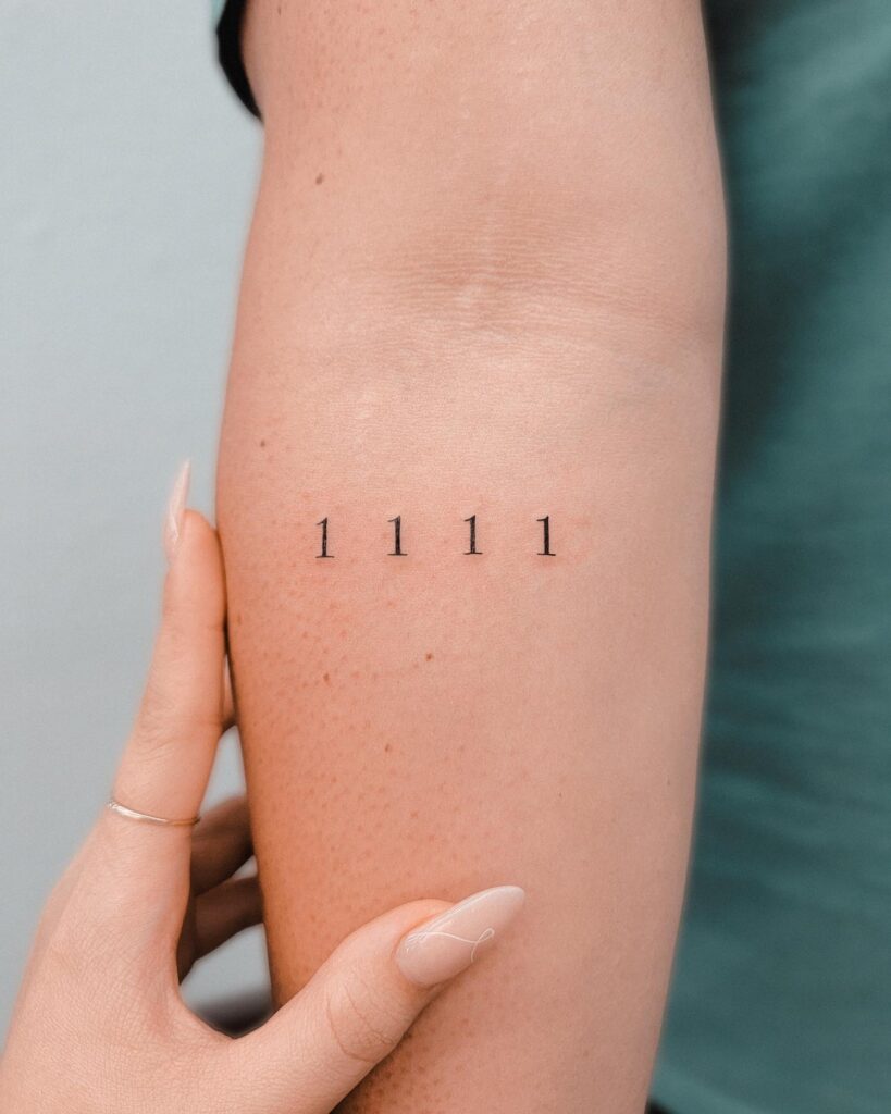 1111 Number Tattoo on the Forearm with Precise Spacing: Divine Alignment