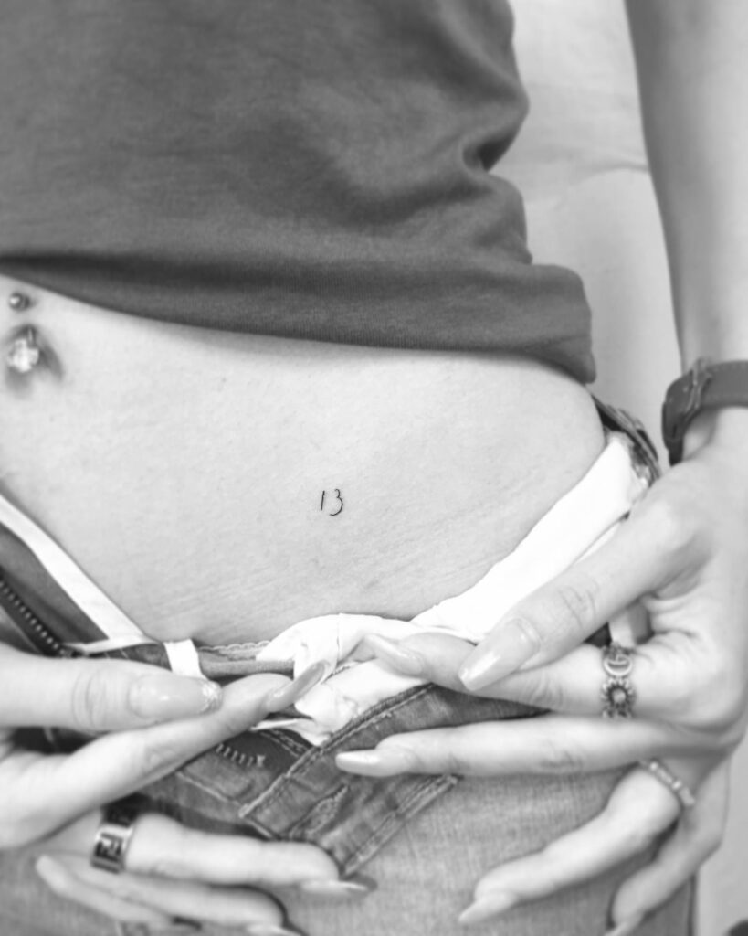 '13' Angel Number Tattoo on the Hip, a Numerical Badge of Spiritual Significance: Angelic Vibes