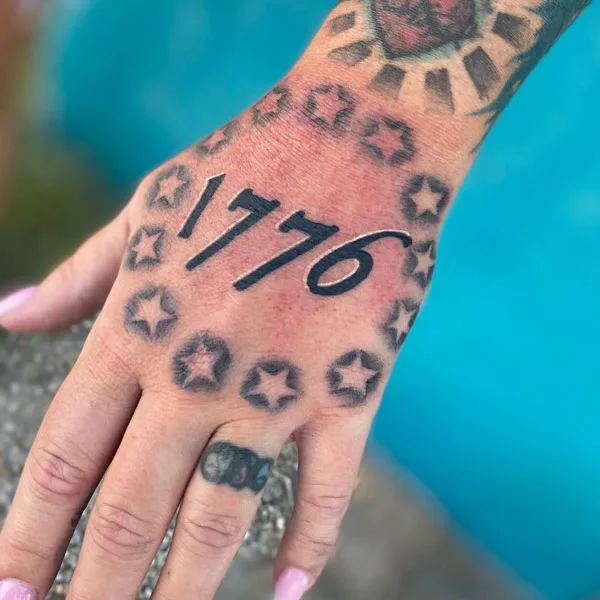 1776 Tattoo on hand