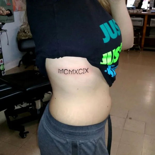 1999 roman numerals tattoo