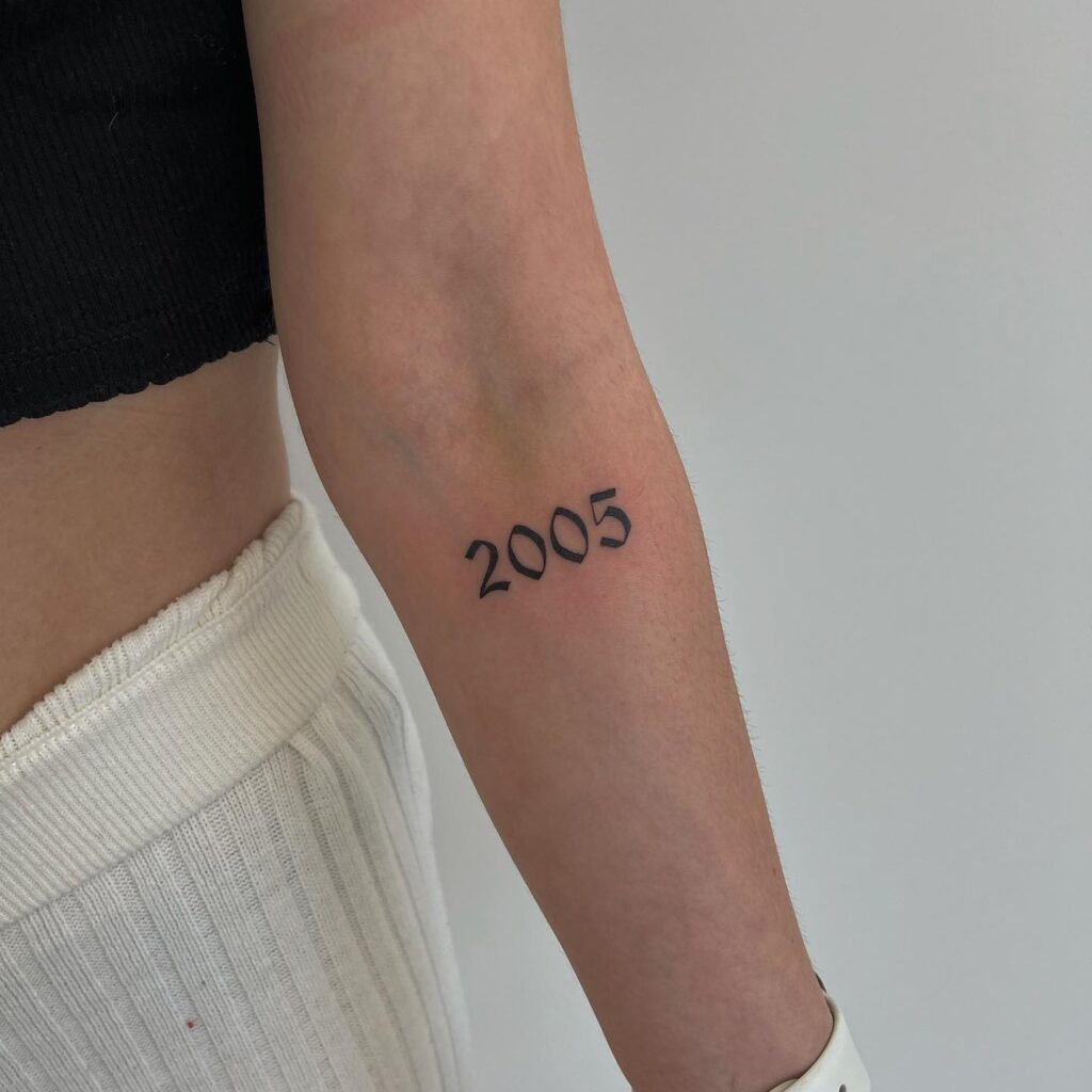 '2005' Text Lettering Tattoo, a Year to Remember on the Forearm: Timeless Memory