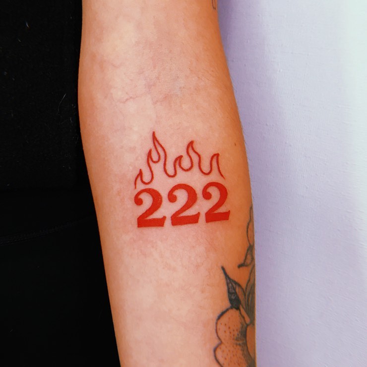 222 and Flame Tattoo Below the Elbow in Red, an Intense Combination: Fiery Fusion 