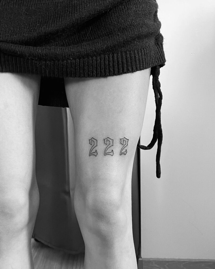 222 Outline Text Lettering Tattoo Above the Knee for Girls, a Stylish Mark: Bold Statement 