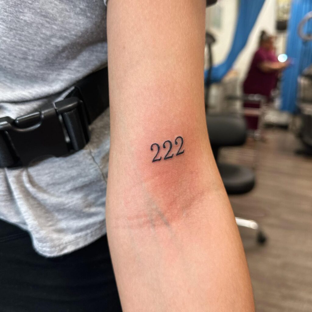 222 Tattoo on the Above the Elbow, a Timeless Design: Simple Elegance 