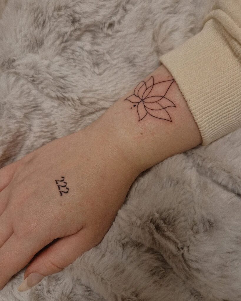 222 Text Lettering Tattoo on the Back of the Hand, a Personal Touch: Handcrafted Harmony 