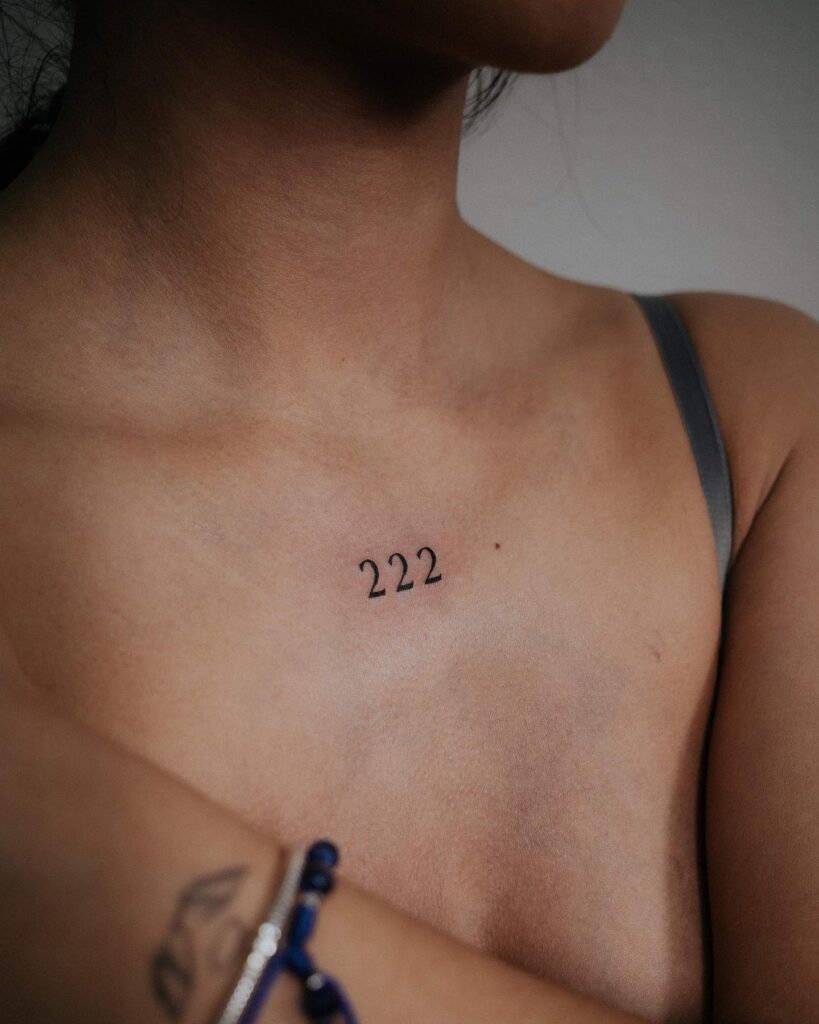 222 Text Lettering Tattoo on the Collarbone: Collarbone Charm, a Personal Mark 