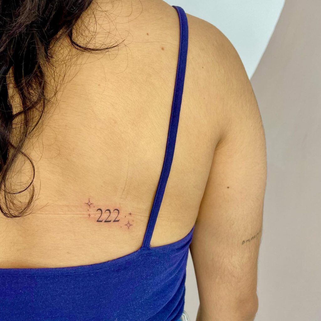 222 Text Number Tattoo Below the Shoulder Blade, a Personal Inscription: Shoulder Scribe 