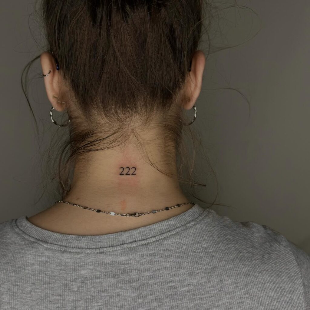 222 Text Tattoo on the Back of the Neck: Neckline Detail, a Stylish Mark 