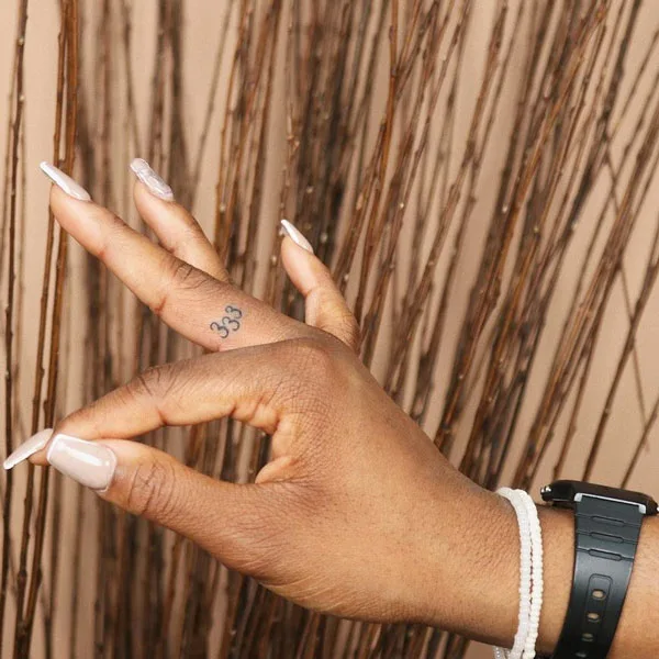 333 tattoo on finger