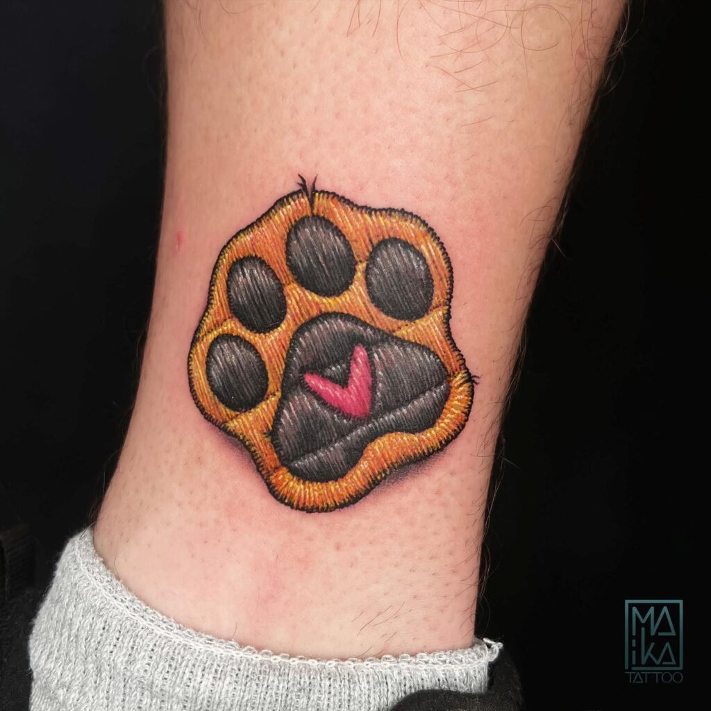 3D Dog Paw Embroidery Tattoo Above the Ankle for a Unique Touch: Ankle Adornment