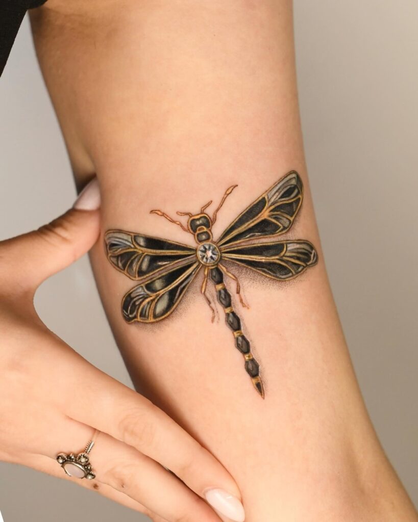 3D Gold and Black Dragonfly Tattoo with Gemstone Accent