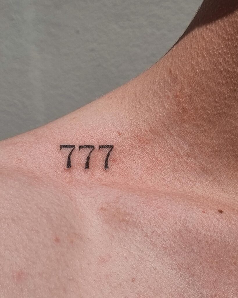 777 number tattoo on the shoulder perfect for numerical enthusiasts shoulder serendipity 
