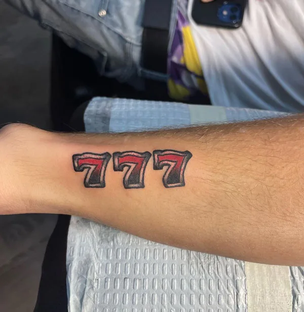 777 tattoo 9