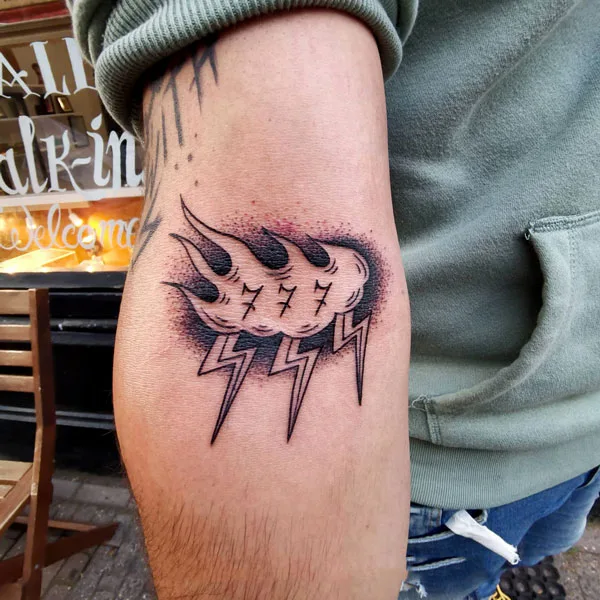 777 tattoo 12