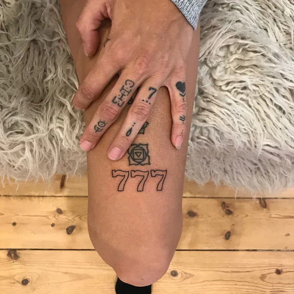 777 tattoo 14