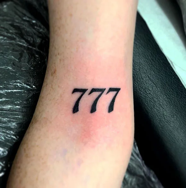 777 tattoo 18