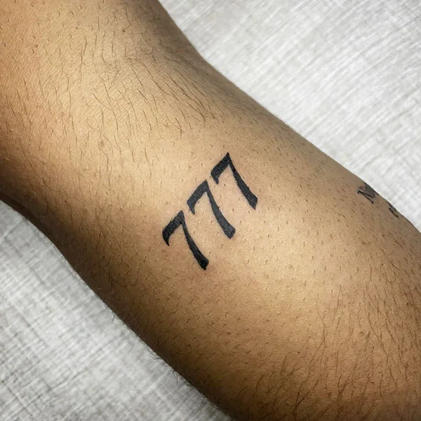777 tattoo 20