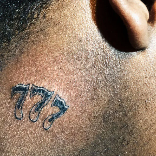 777 tattoo 21