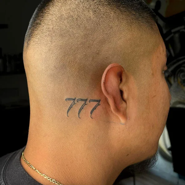 777 tattoo 23
