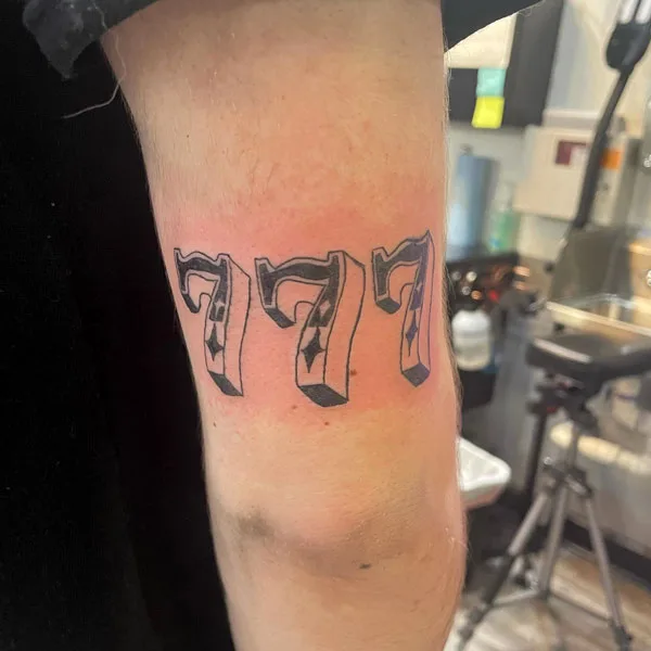 777 tattoo 28