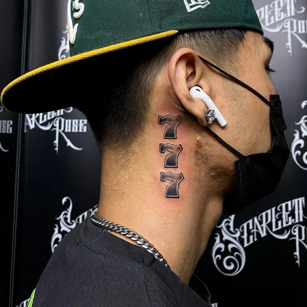777 tattoo 34
