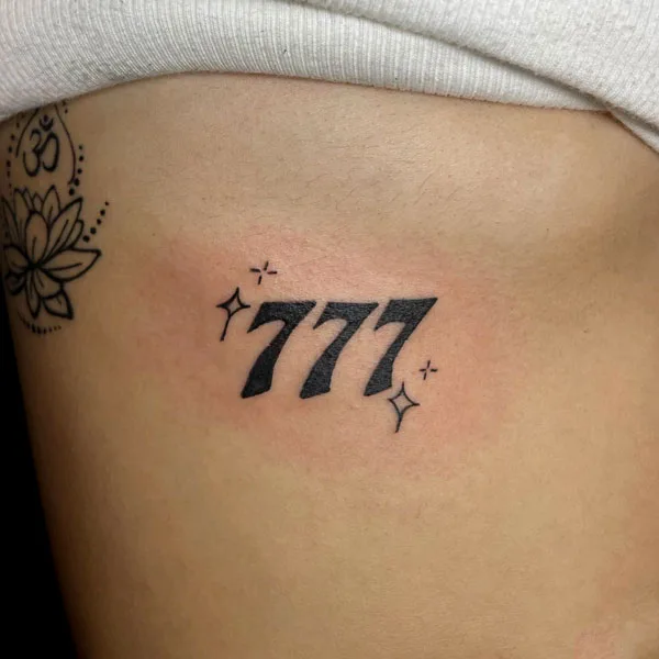 777 tattoo 36