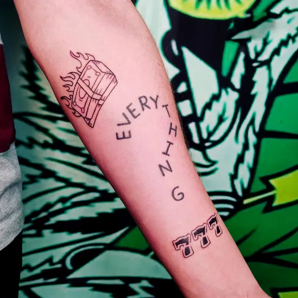 777 tattoo 37