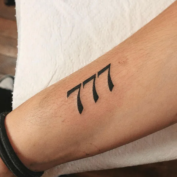 777 tattoo 40