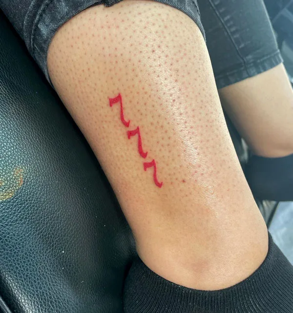 777 tattoo 43