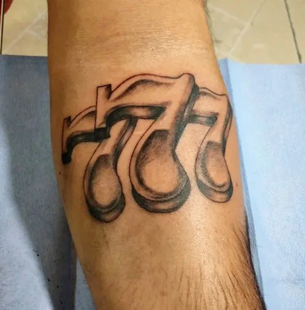777 tattoo 50