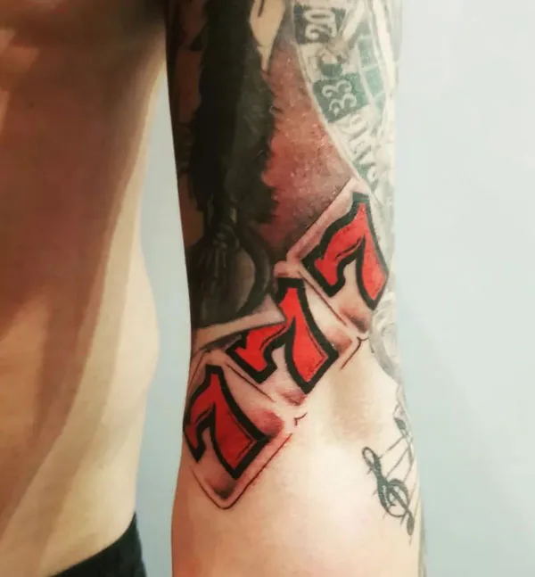 777 tattoo 57