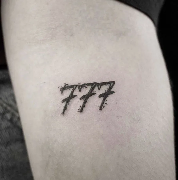 777 tattoo 58