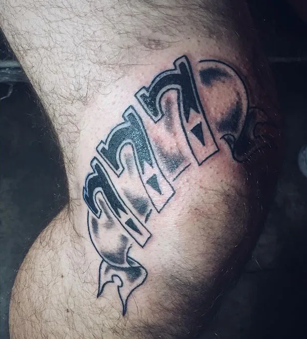 777 tattoo 61