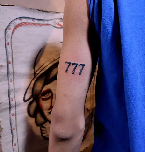 777 tattoo 62