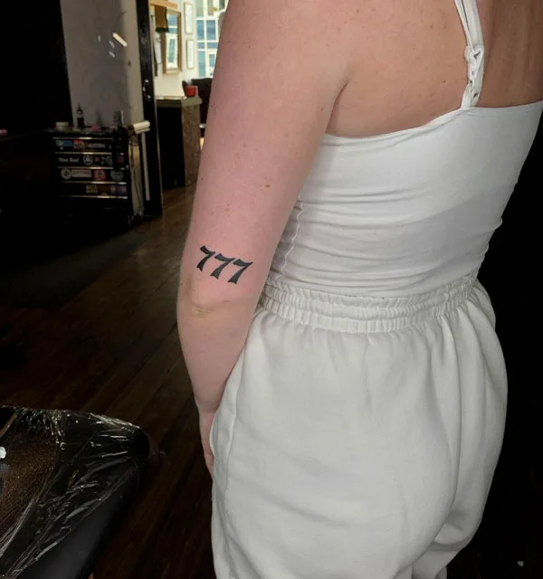 777 tattoo 63