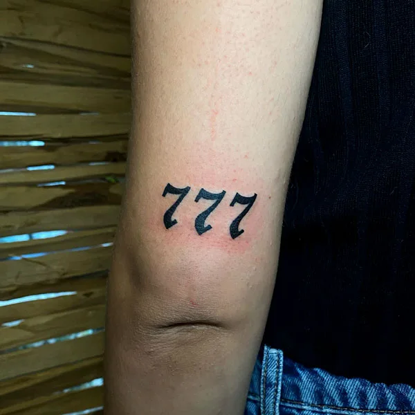 777 tattoo 6