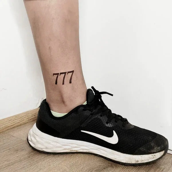 777 tattoo 71