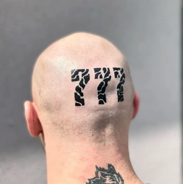 777 tattoo 74