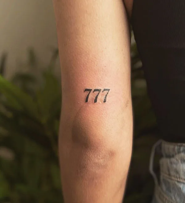 777 tattoo 77