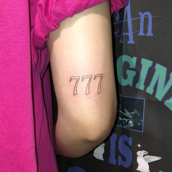 777 tattoo 84