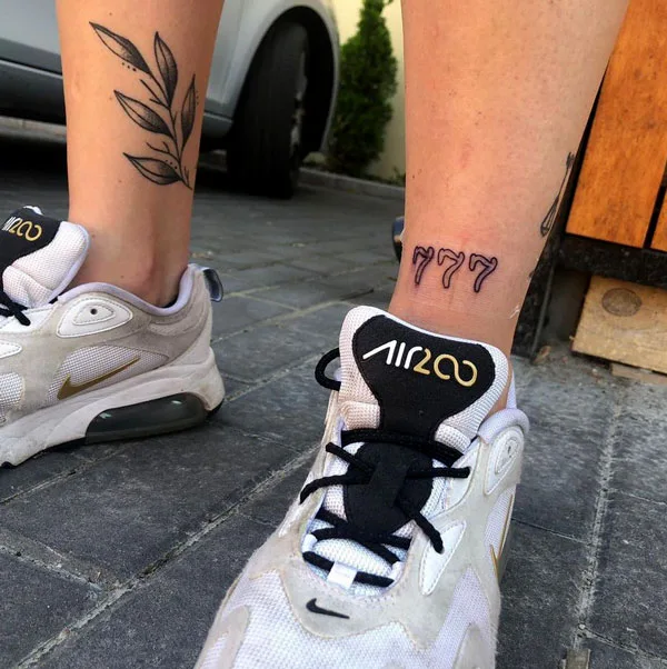 777 tattoo 8