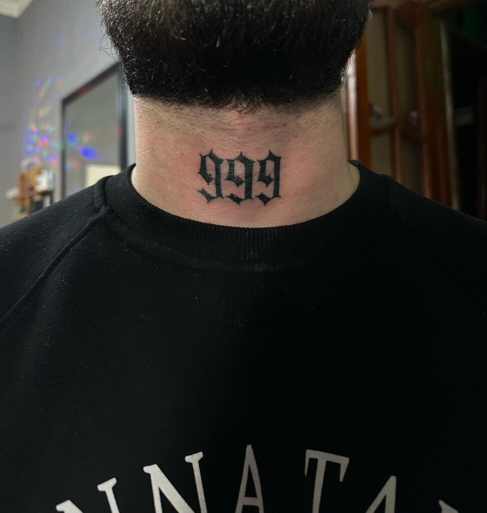 999 Angel Number Tattoo, Stylishly Bold Font, on the Front Neck: Angelic Code