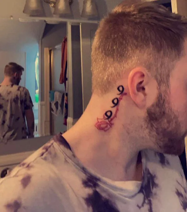 999 tattoo behind ear 2