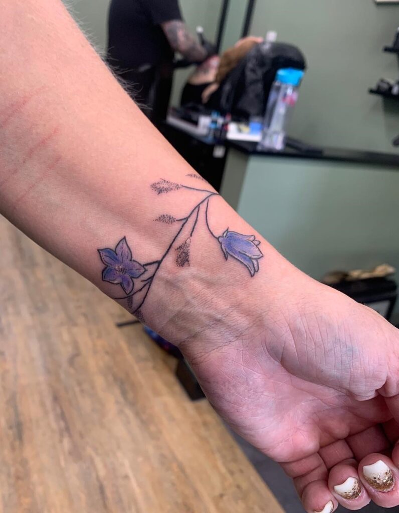 A Band of Bluebell Flowers for a Delicate Wrist Band Tattoo: Wrist Elegance