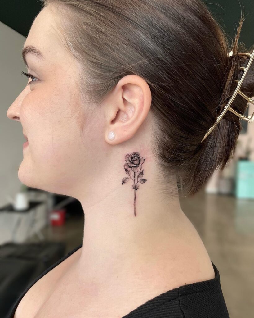 A touch of delicacy small rose neck tattoos for women